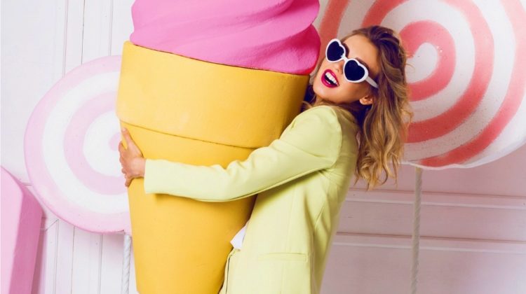 Cute fashionable blonde woman holding big props pink ice cream , wearing stylish vintage heart glasses , laughing | Life Hacks: Mess-Free Pancakes, Color-Coded Keys, And A Tasty Way To Amp Up Your Ice Cream Sundae