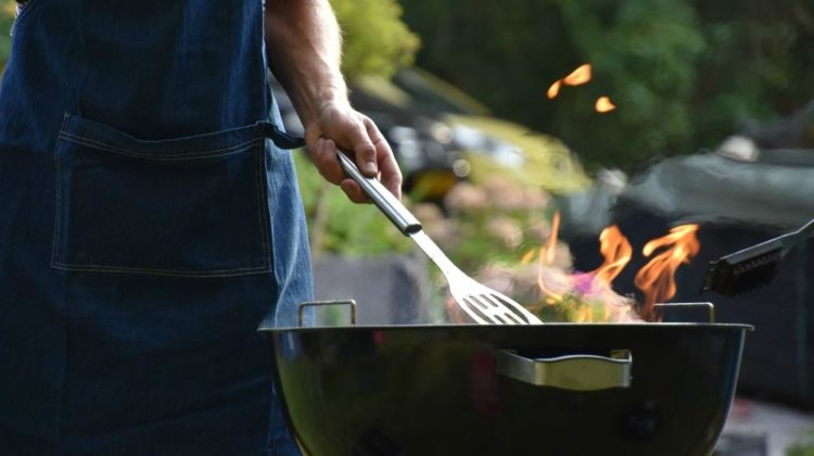 Featured | Man using BBQ | Smart Grill Accessories For The Above-Average Griller