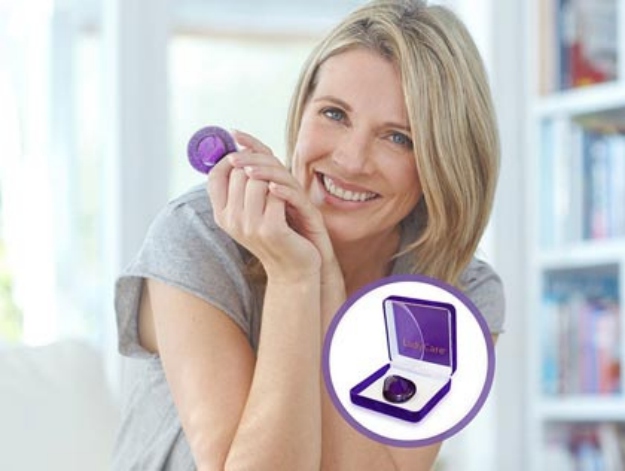 Smiling woman holding ladycare | Products Every Woman In Your Life Will Thank You For